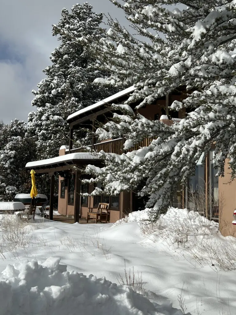 Taos vacation rental covered in snow